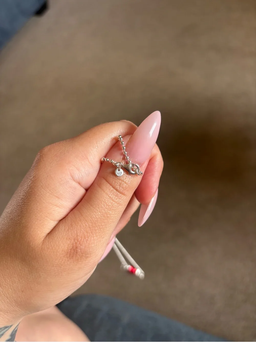 Pandora necklace featuring